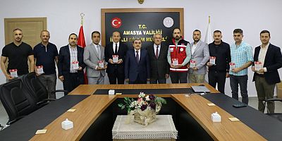 MEB AKUB Ekibine  Plaket Takdim Edildi